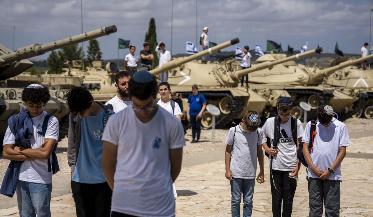 Israel notes Memorial Day, as hundreds of thousands flee Rafah assault