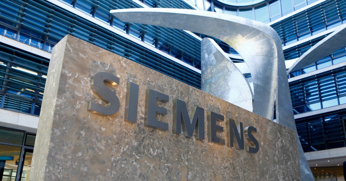 In this June 24, 2016 file photo the logo of German industrial conglomerate Siemens is pictured prior to the opening ceremony at the new headquarters in Munich, Germany.