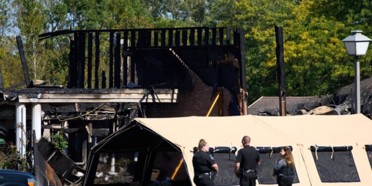 Woman who was confronted by Michigan church gunman says she instantly forgave him for killing dad