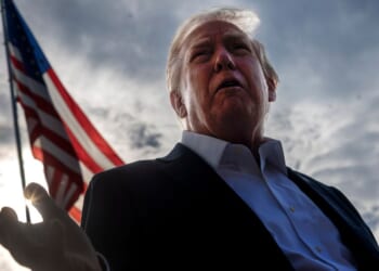President Donald Trump speaks to members of the media as he departs the White House in Washington, D.C., on Sept. 26.