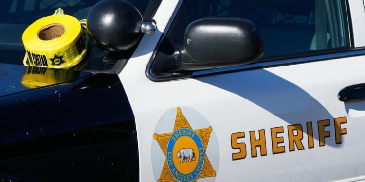 Man crashes into Los Angeles City Hall steps and has nearly two-hour long standoff with cops