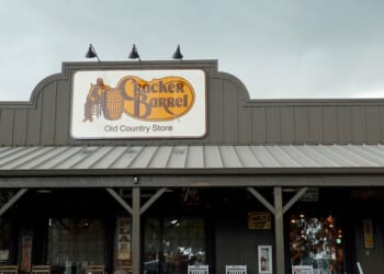 A Cracker Barrel sign featuring the old logo hangs outside of a restaurant on Aug. 27, 2025, in Florida City, Florida.
