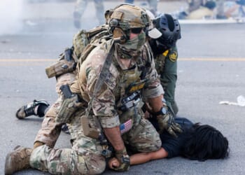 Using helicopters and chemical agents, immigration agents become increasingly aggressive in Chicago