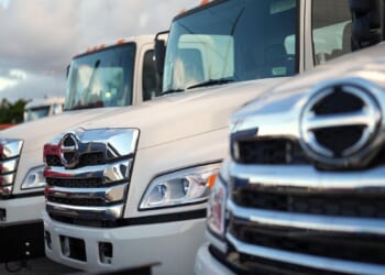 Trump signs order imposing tariffs on heavy trucks, buses and parts