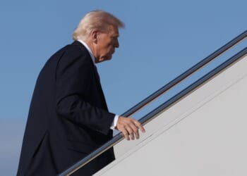 President Donald Trump climbs the stairs to Air Force One in Maryland on Oct. 17, 2025.