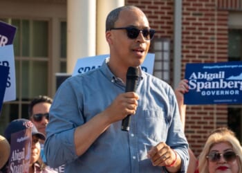 Jay Jones, who is running to become Virginia's attorney general, speaks to the audience during Abigail Spanberger's bus tour stop in Fairfax, Virginia, on June 26.