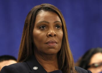 New York Attorney General Letitia James stands silently during a news conference in New York City on Oct. 21, 2025.