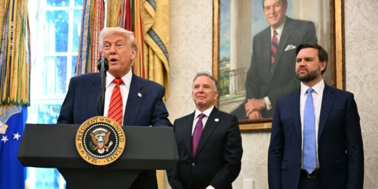 Vice President J.D. Vance looks on as President Donald Trump participates in a swearing-in ceremony for the Special Envoy Steve Witkoff in the Oval Office of the White House in Washington, D.C., on May 6, 2025.