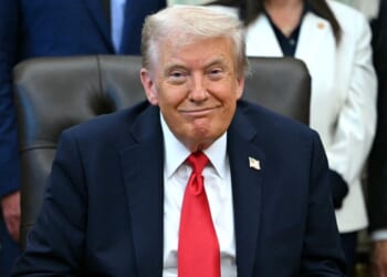 President Donald Trump smiles during an announcement in the Oval Office of the White House in Washington, D.C., on Oct. 16, 2025.