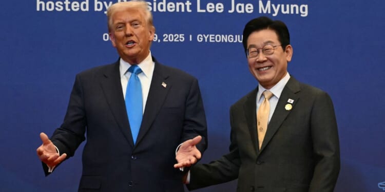 President Donald Trump, left, and South Korean President Lee Jae Myung, right, meet before a special dinner in Gyeongju on Wednesday.