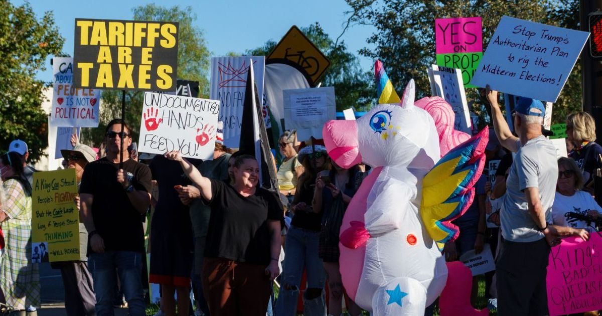 Demonstrators participate in the second "No Kings" protest Saturday in Thousand Oaks, California.