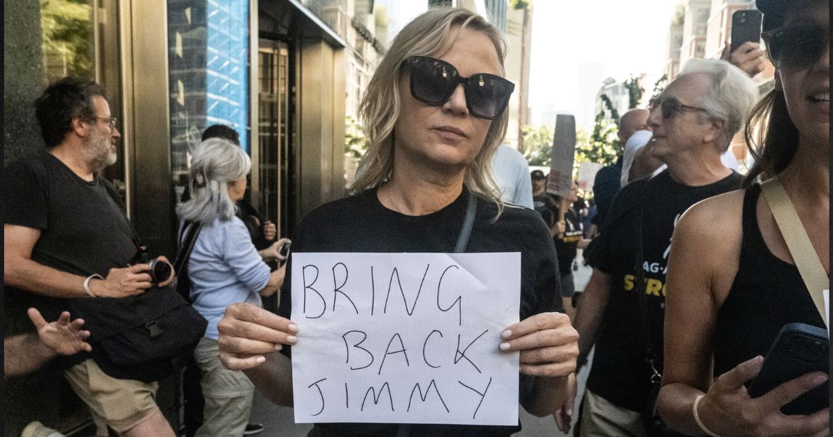 Fans of late-night host Jimmy Kimmel participate in a protest against ABC's decision to suspend Jimmy Kimmel from his show on Sept. 19 in New York City. ABC suspended Kimmel over comments he made about Charlie Kirk's shooting.