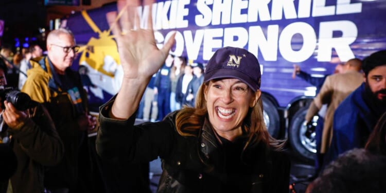 Democratic gubernatorial candidate Mikie Sherrill waves during a campaign event in Montclair, New Jersey, on Nov. 3, 2025.