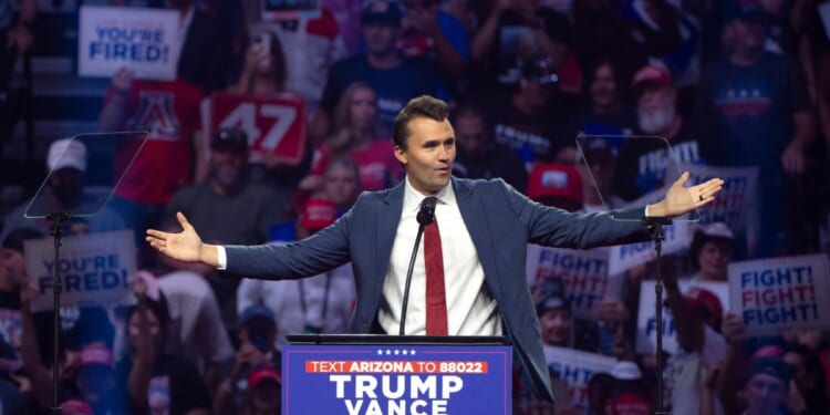 Turning Point USA founder Charlie Kirk speaks during a campaign rally for President Donald Trump at Desert Diamond Arena on Aug. 23, 2024, in Glendale, Arizona.