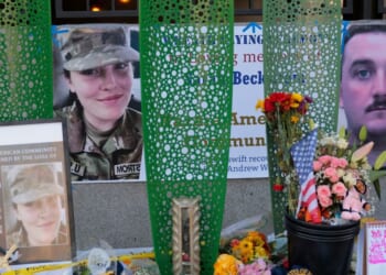 A makeshift memorial stands outside the Farragut West Metro station on Dec. 1, 2025, in Washington, D.C.