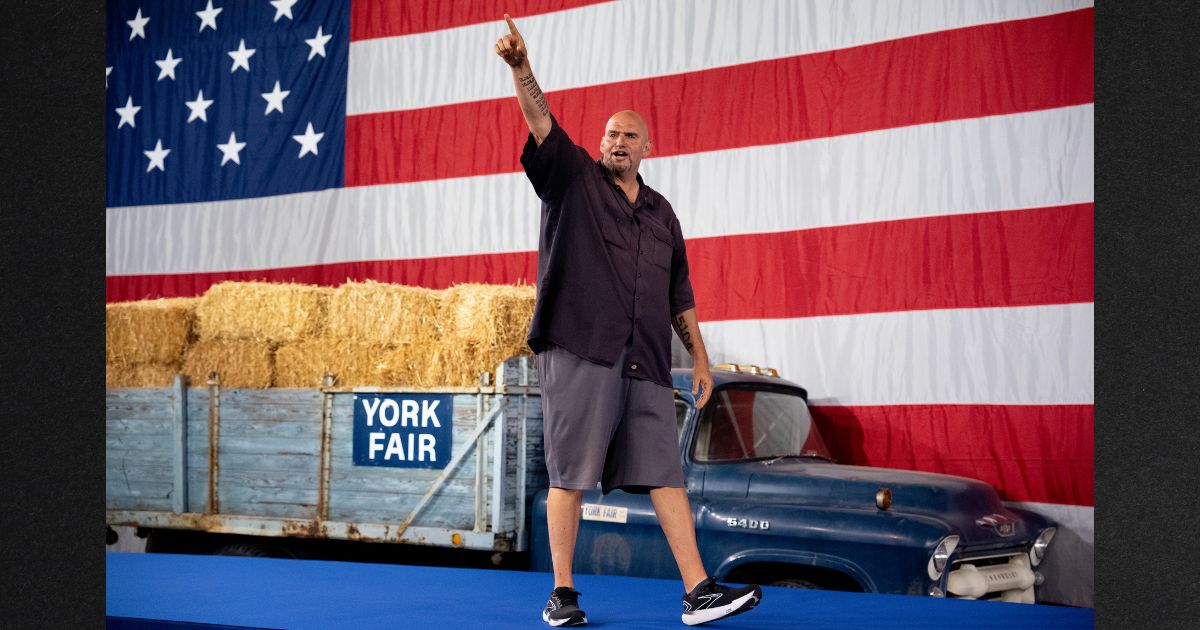 Sen. John Fetterman, a Pennsylvania Democrat, seen at an October 2024 rally for then-vice presidential nominee Minnesota Gov. Tim Walz, has frequently emerged as a voice of reason amid the increasingly contentious division between Democrats and Republicans