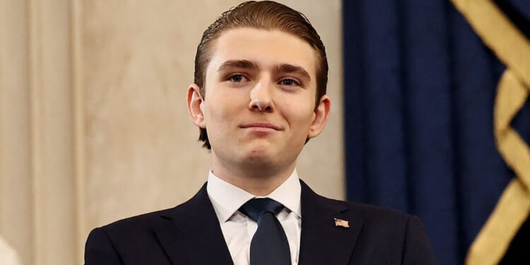Barron Trump, seen in a Jan. 20 photo at the inauguration of his father, President Donald Trump, is "very close to putting his faith in Christ," a pastor revealed on a recent podcast.