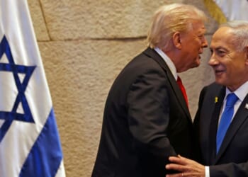 President Donald Trump speaks with Israel's Prime Minister Benjamin Netanyahu in the Knesset, Israel's parliament, in a file photo from Oct. 13.