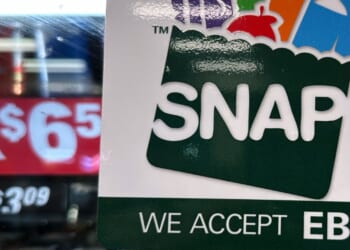 A SNAP EBT information sign is displayed at a gas station in Riverwoods, Illinois, on Nov. 1, 2025.