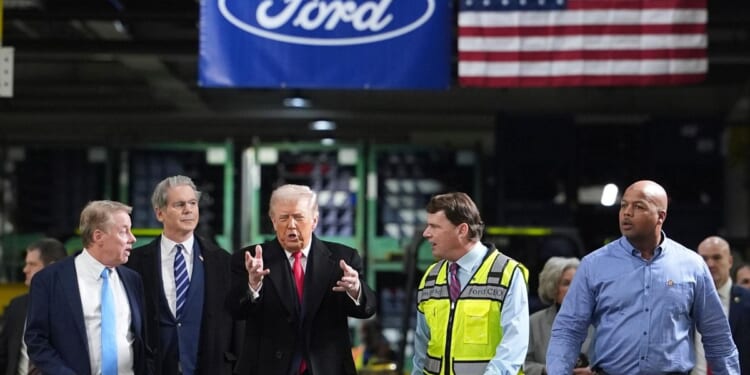 Trump appears to flip middle finger to Ford autoworker; mouths 'F*** you'