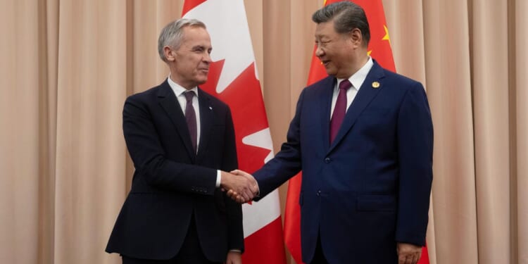 China urges Canada to break from U.S. influence as Carney visits Beijing