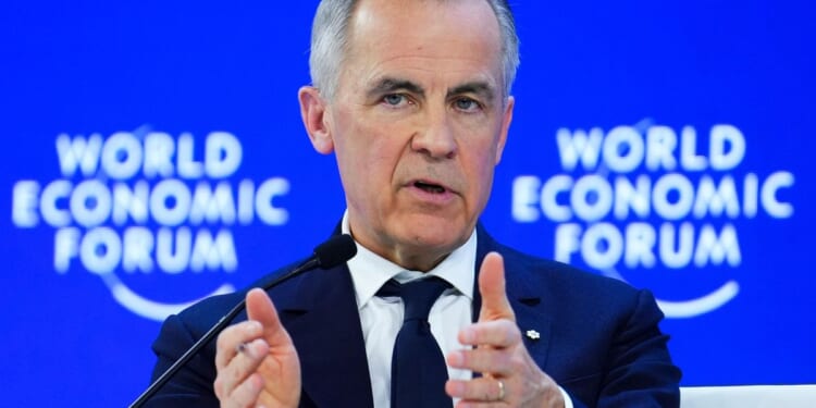 Carney says Canada will respect USMCA commitments after Trump threatens 100% tariffs