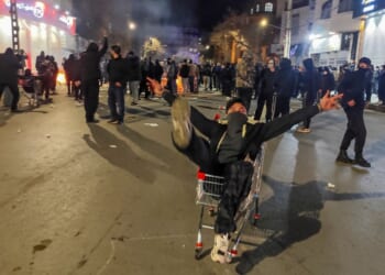 Iranians gather while blocking a street during a protest in Kermanshah, Iran, on Jan. 8, 2026.