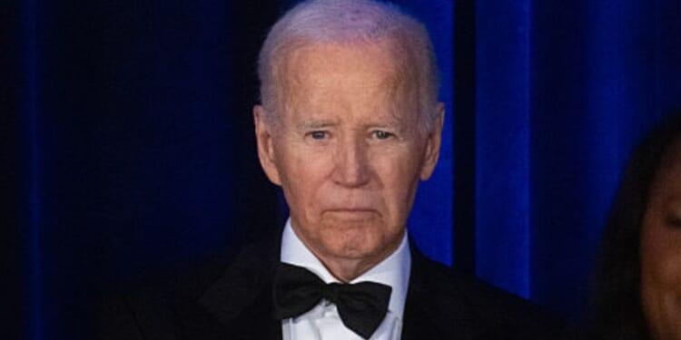 Former President Joe Biden, seen in a July photo, is raking in the largest pension of any U.S. president in history.