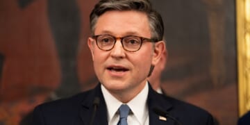House Speaker Mike Johnson addresses the media Thursday after the House voted to pass its final slate of spending bills for the upcoming fiscal year.