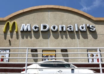 A customer waits in the drive thru lane at a McDonald's restaurant on July 22, 2024, in Burbank, California.