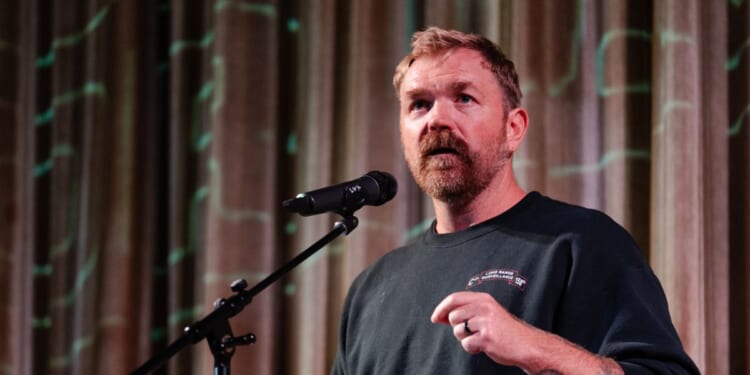 U.S. Senate candidate Graham Platner speaks at a town hall at the Leavitt Theater on Oct. 22, 2025, in Ogunquit, Maine.