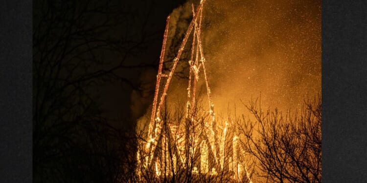 The tower of the Vondelkerk church burns early New Year's Day in Amsterdam.