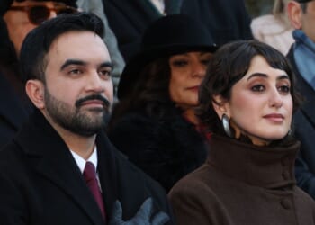 New York City Mayor Zohran Mamdani and his wife Rama Duwaji listen to the national anthem during his public inauguration ceremony followed by a block party at City Hall in New York on Jan. 1, 2026.
