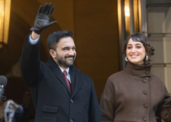 New York Mayor Zohran Mamdani and his wife Rama Duwaji wave to supporters at his ceremonial inauguration as mayor Thursday.