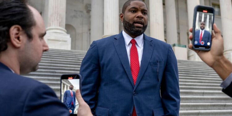 Rep. Byron Donalds, a Florida Republican, speaks to reporters following a House vote in a November photo