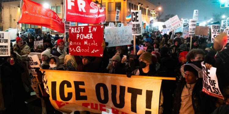 People gather for a protest after the killing of Renee Nicole Good on Jan. 8, 2026, in Minneapolis, Minnesota.