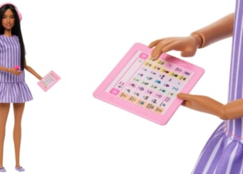 The autistic Barbie comes with headphones to cancel noise and a simulated computer tablet used for communication.
