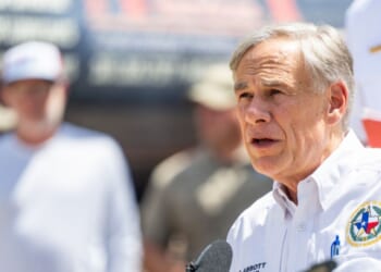 Gov. Greg Abbott speaks at a news conference on July 8, 2025, in Hunt, Texas.