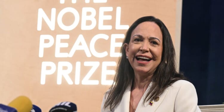 Maria Corina Machado, the Venezuelan opposition figure and 2025 Nobel Peace Prize recipient, attends a press conference on Dec. 11, 2025, in Oslo, Norway.