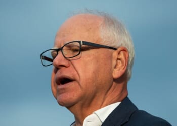 Minnesota Gov. Tim Walz speaks to media gathered on the first day of school at Deerwood Elementary on Sept. 2, 2025, in Eagan, Minnesota.