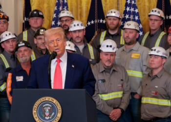 President Donald Trump speaks alongside coal and energy workers during an executive order signing ceremony in the East Room of the White House on April 8, 2025, in Washington, D.C.