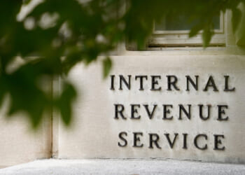 A sign is displayed outside the Internal Revenue Service building May 4, 2021, in Washington, D.C.