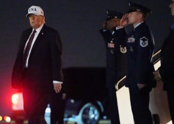 President Donald Trump deplanes from Air Force One at Palm Beach International Airport in West Palm Beach, Florida on Friday.