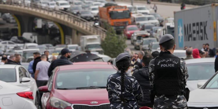 Israel launches strikes on Beirut after Hezbollah fired missiles across the border