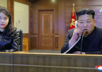 North Korean leader Kim and his daughter try out new pistols at shooting range