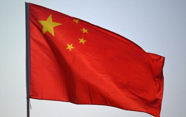 Chinese flag waves in Nanning, China on October 15, 2025.