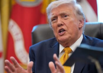 President Donald Trump speaks in the Oval Office on Monday after signing an executive order establishing a task force on fraud.