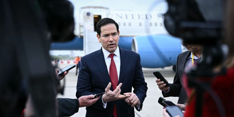 Secretary of State Marco Rubio speaks to the news media Friday following a G7 Foreign Ministers' meeting with partner countries before his departure at the Bourget airport outside Paris.