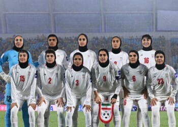 Islamic Republic of Iran players line up for a team photo prior to the AFC Women's Asian Cup Australia 2026 match between the Islamic Republic of Iran and Australia Matildas at Gold Coast Stadium on March 5, 2026, in Gold Coast, Australia.
