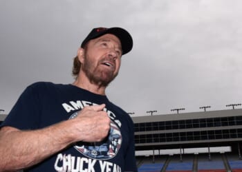 Actor Chuck Norris reacts prior to the NASCAR Sprint Cup Series AAA Texas 500 at Texas Motor Speedway on Nov. 6, 2016, in Fort Worth, Texas.